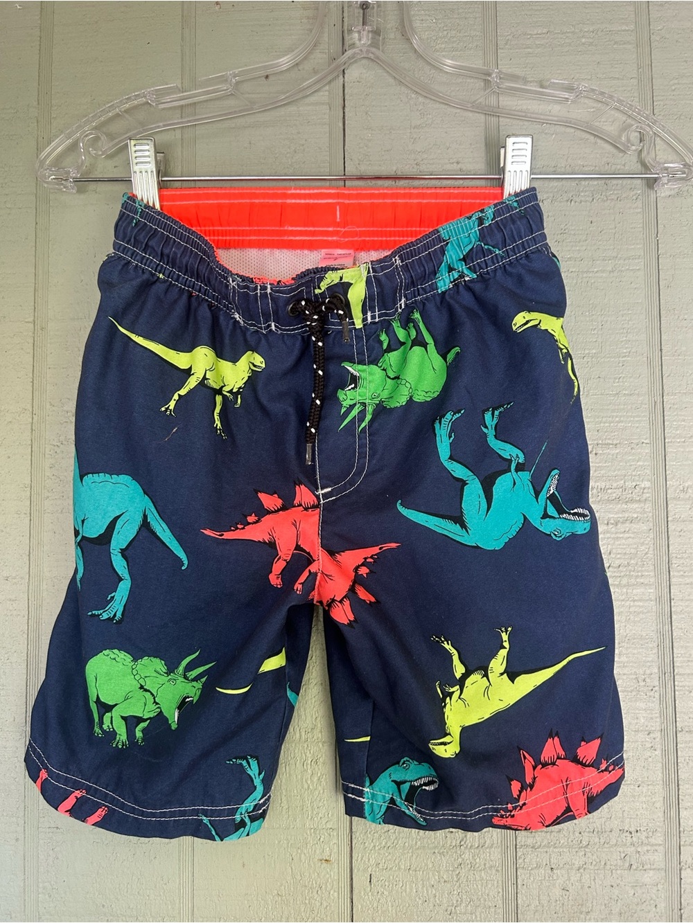 Carter's Navy Swim Trunks with Red, Green, Teal Dinosaurs